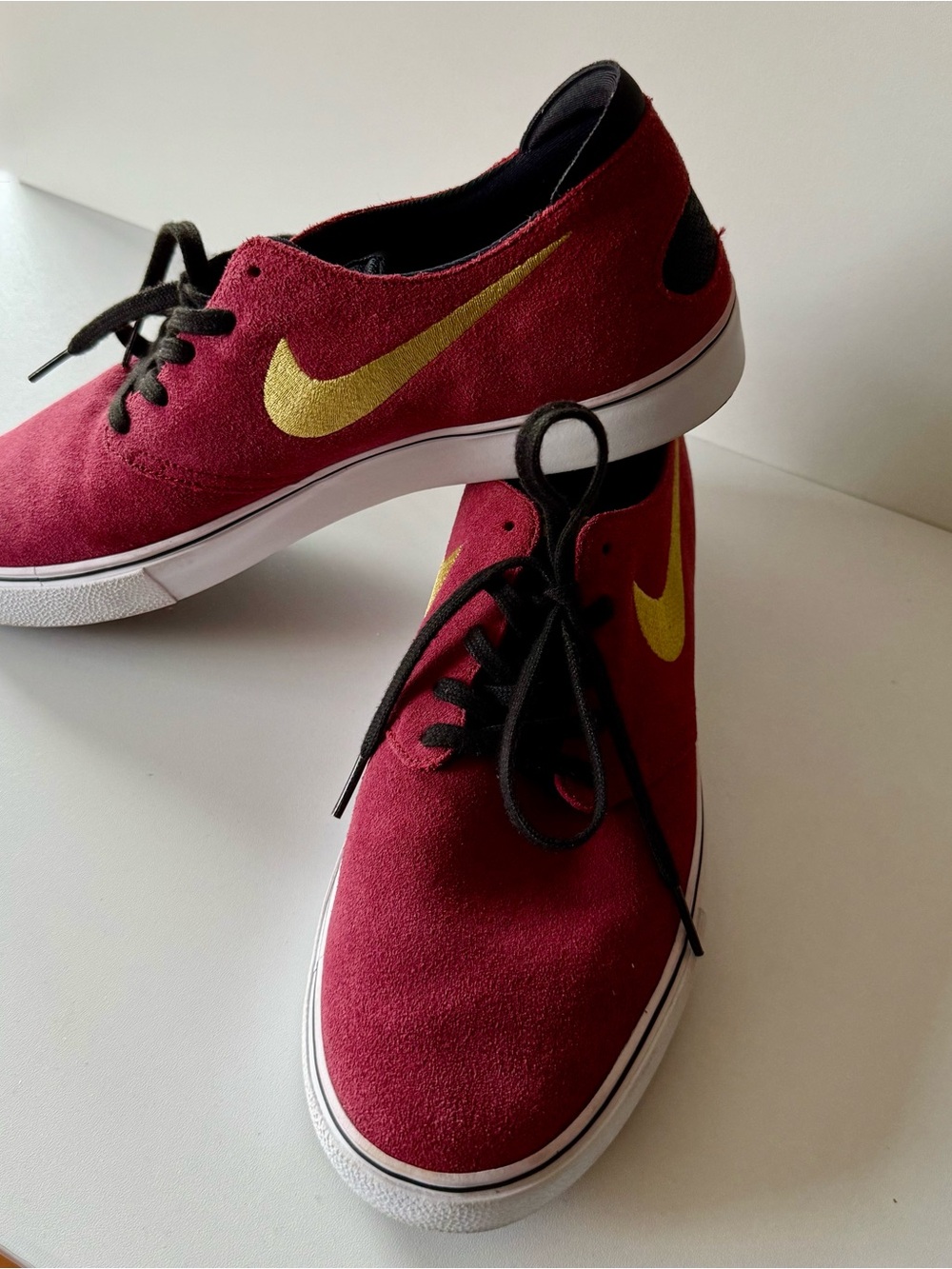Nike Burgundy Suede Sneakers with Gold Swoosh and Black Laces